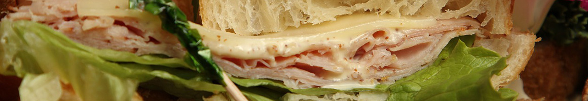 Eating Sandwich Cafe at Greenbriar Cafe and Coffeehouse restaurant in Richmond, VA.